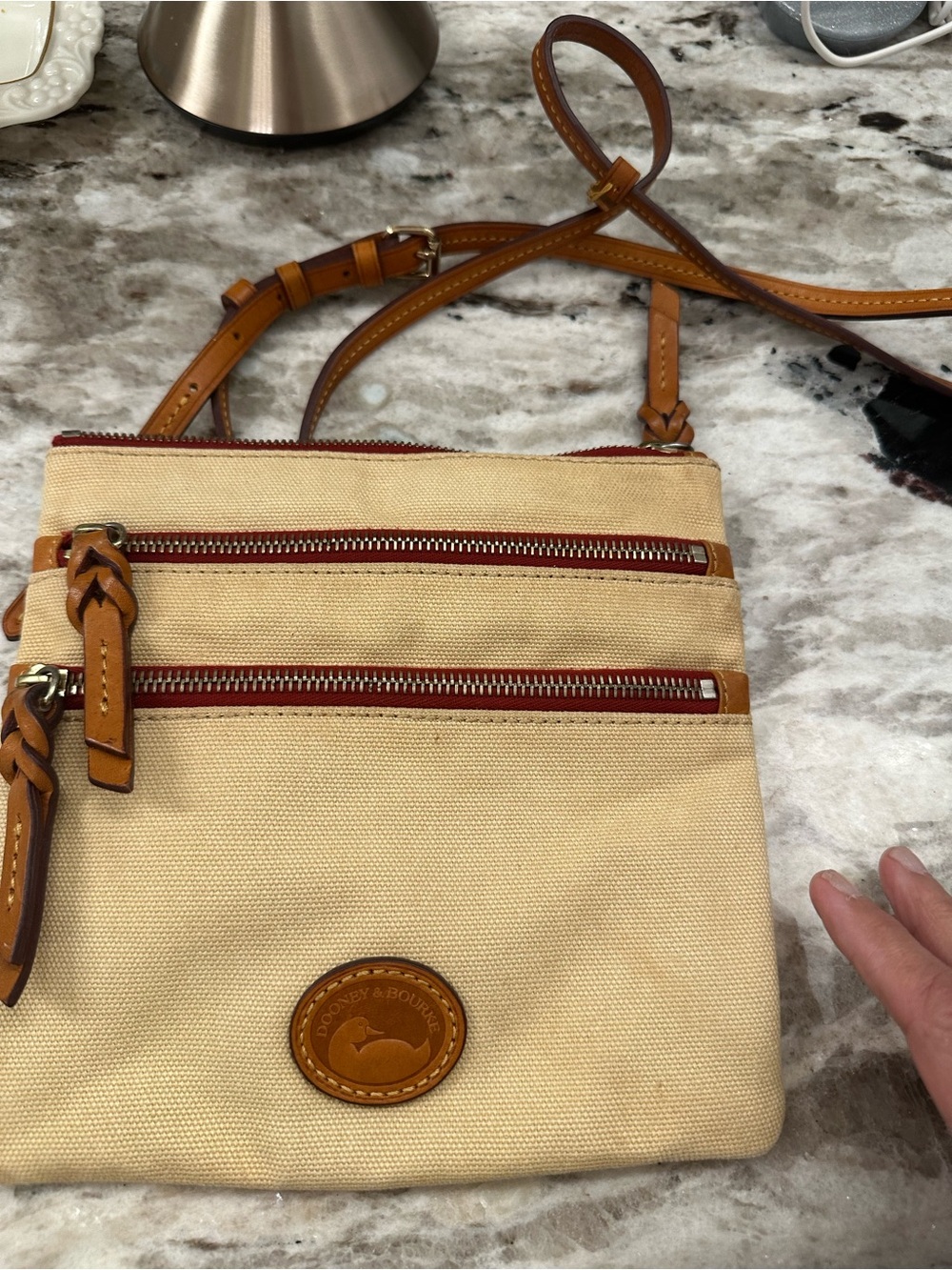 Dooney & Bourke Beige Canvas Crossbody with Tan Leather Trim and Red Zippers